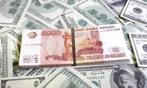 Курс доллара на торгах преодолел отметку в 63 рубля