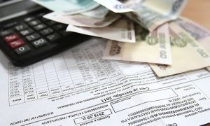 В Петербурге собственникам жилья в коммунальные квитанции вписали чужие долги
