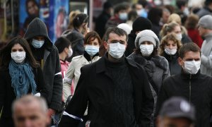 ВОЗ рекомендовала гражданам носить защитные маски даже на улице