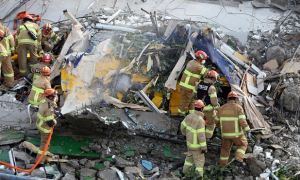 В Южной Корее пятиэтажный дом рухнул на пассажирский автобус